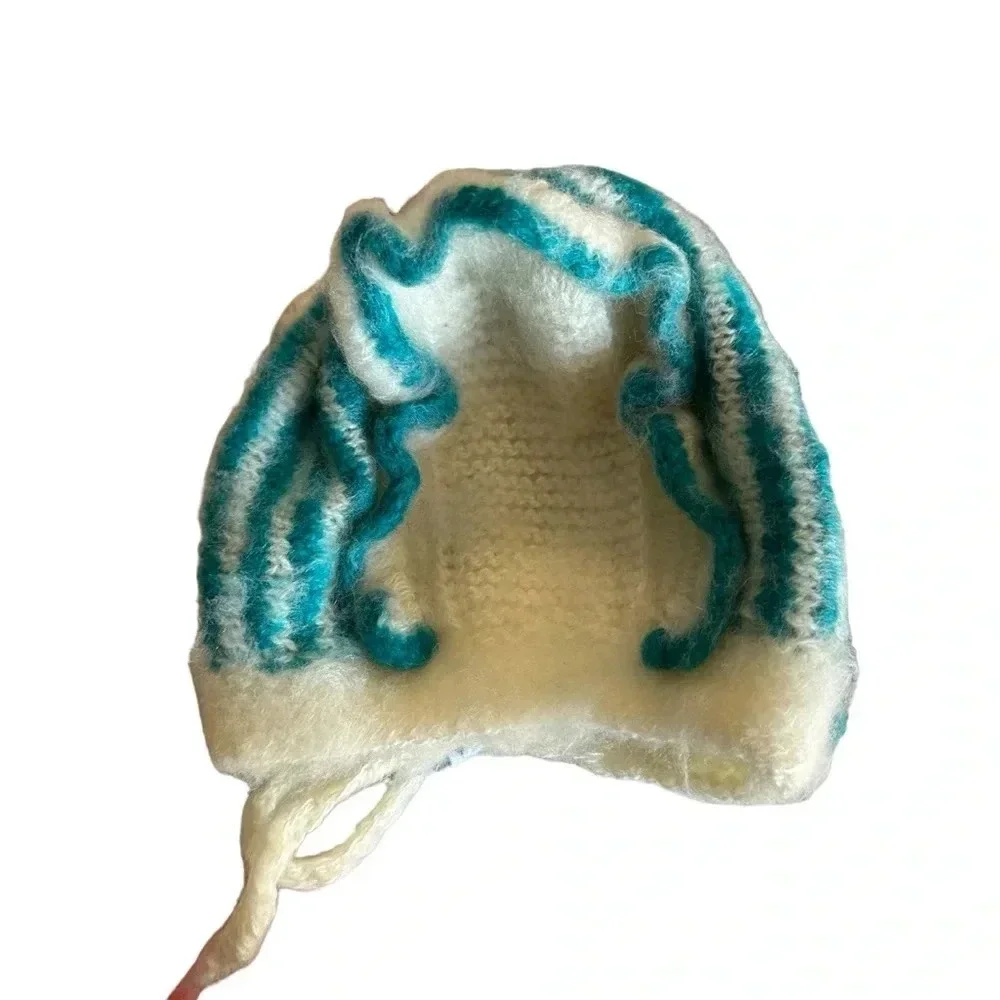Handmade baby girls knit by bonnet, cream and turquoise
